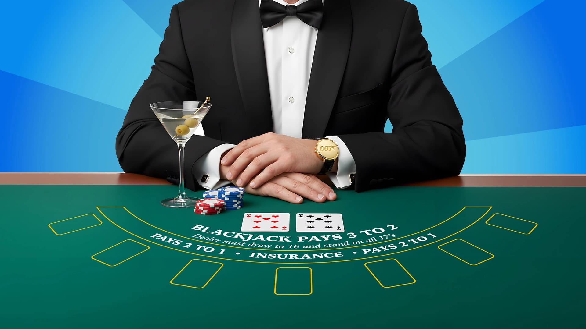 a man in a tuxedo and a martini glass sits at a blackjack table