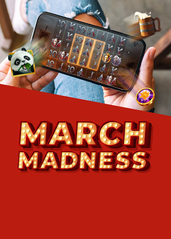 Featured on top of a red background overlay is a Vegas-style sign that reads “March Madness”. Above, we see a person sitting on a wooden chair cross-legged with blue-colored jeans, holding up their mobile phone which shows a screenshot from a Cafe Casino slot game.