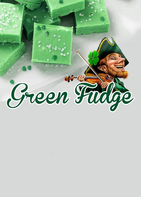 A handful of square-cut green fudge sit atop a white plate, sprinkled with sugar and green food dye. Below, the main cartoon leprechaun character from the Cafe Casino slot game, Leprechaun Legends is depicted, wearing a green suit, bushy beard, a fiddle and a large green hat with a four-leaf clover.