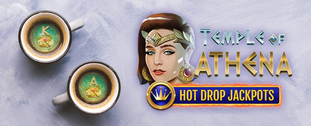 A 3D-animated female head of the central character from the Cafe Casino slot game, Temple of Athena Hot Drop Jackpots, is pictured alongside the logo from the same game. To the left, are two coffee mugs, each filled with coffee sprinkled with the slots symbols K and A.
