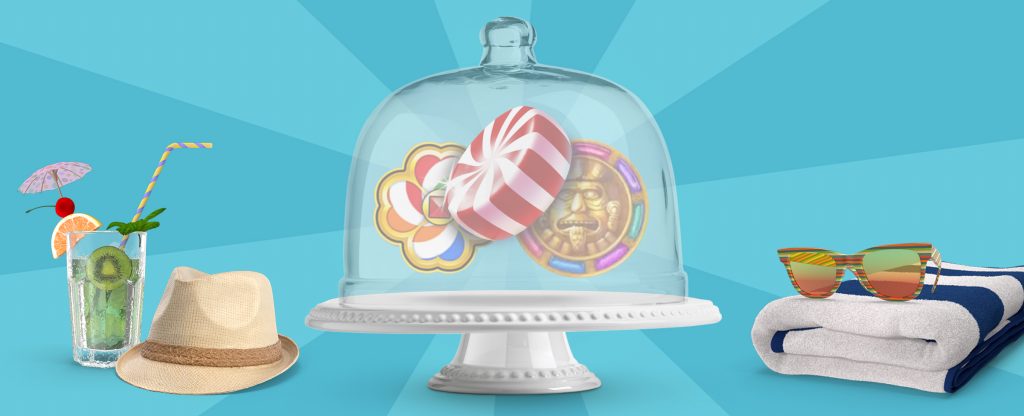 A 3D-animated a cake stand with a glass cloche, filled with two swirled candies and a stone carving - symbols from Cafe Casino slot games.