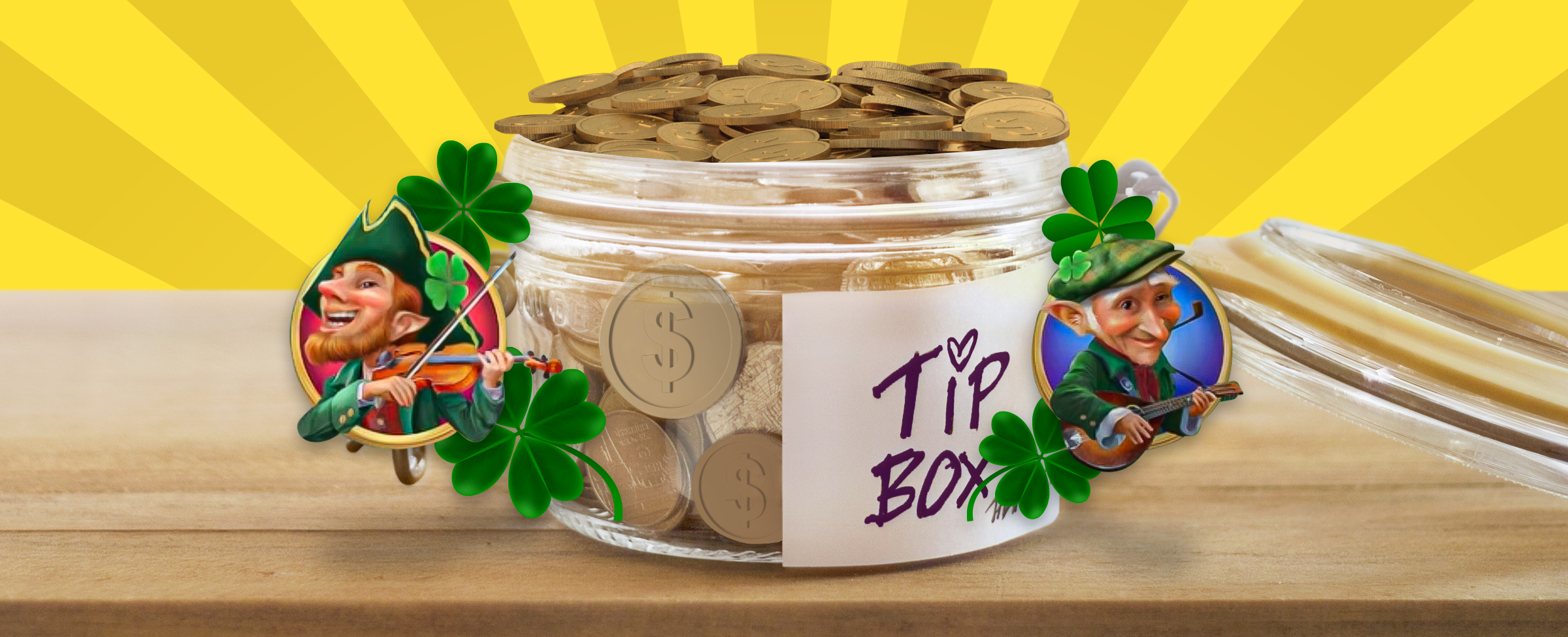 A glass jar filled with gold coins sits on a wooden bench with its lid leaning against it, with a white sticker labeled “tip box”. Either side are two icons from the Cafe Casino slot game, Leprechaun Legends, featuring two leprechauns – one playing the fiddle, and the other a guitar, both with a four-leaf clover above.