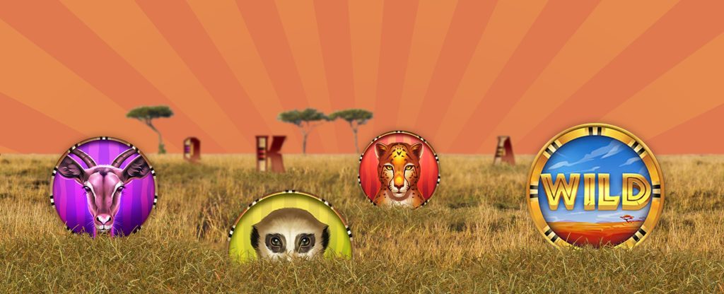 A field of grass with sparse trees in the middle distance is seen against a horizon of illustrated red sky, while four Cafe Casino game symbols peek up from the grass, featuring a deer, a meerkat, a cheetah, and a blue and gold badge featuring the word “wild”.