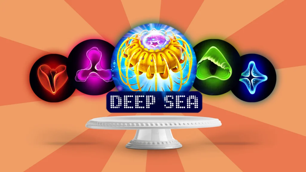 Icons and graphics from the Cafe Casino slots game ‘Deep Sea’ hover above a cake stand, set against an apricot background.