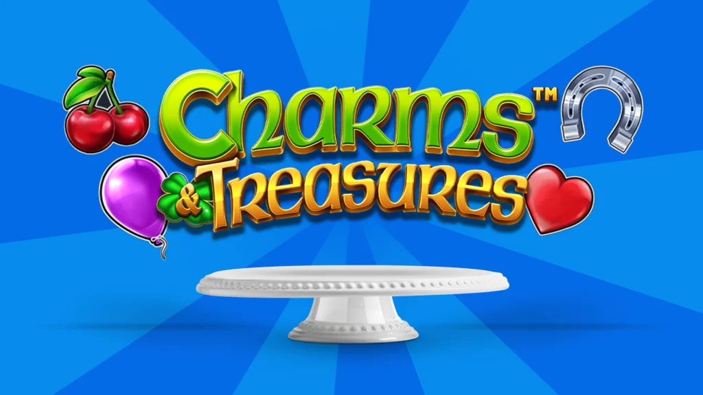 The logo for the Cafe Casino slot Charms & Treasures is centered, symbols from the game also feature including a horse shoe, a cherry and a heart. On a blue background.