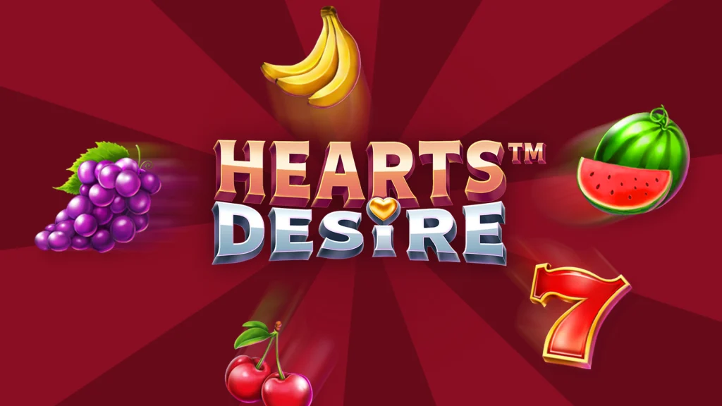The logo for the Cafe Casino online slot, Hearts Desire, is centered with traditional fruit machine style symbols adjacent, on a red background.