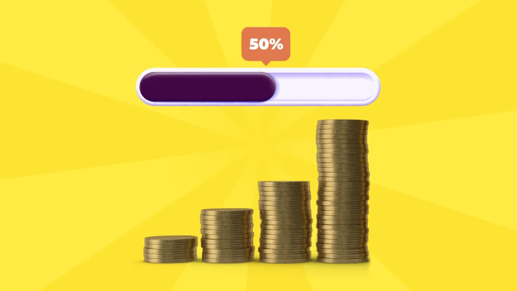 Four tiered piles of coins are centered with a loading bar above, which reads ‘50%’, on a yellow background.