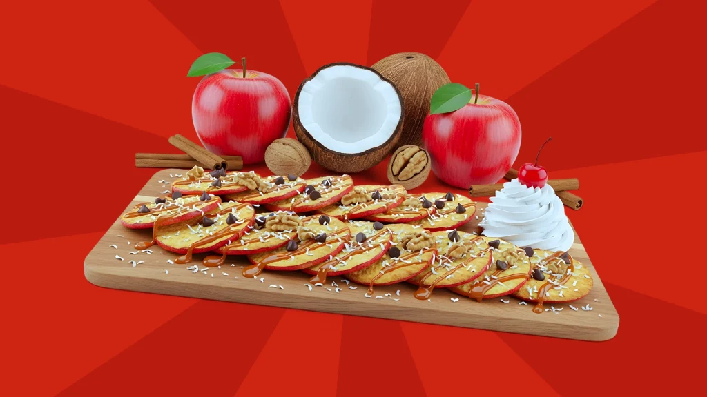 a sweet snack board with apple slices, cocnuts, walnuts and whipped cream on a red background