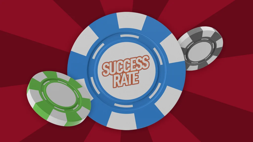 On a blue betting chip in the center of a dark red background, it says, “Success Rate” in white block letters. In front and behind it are a green and black betting chip.