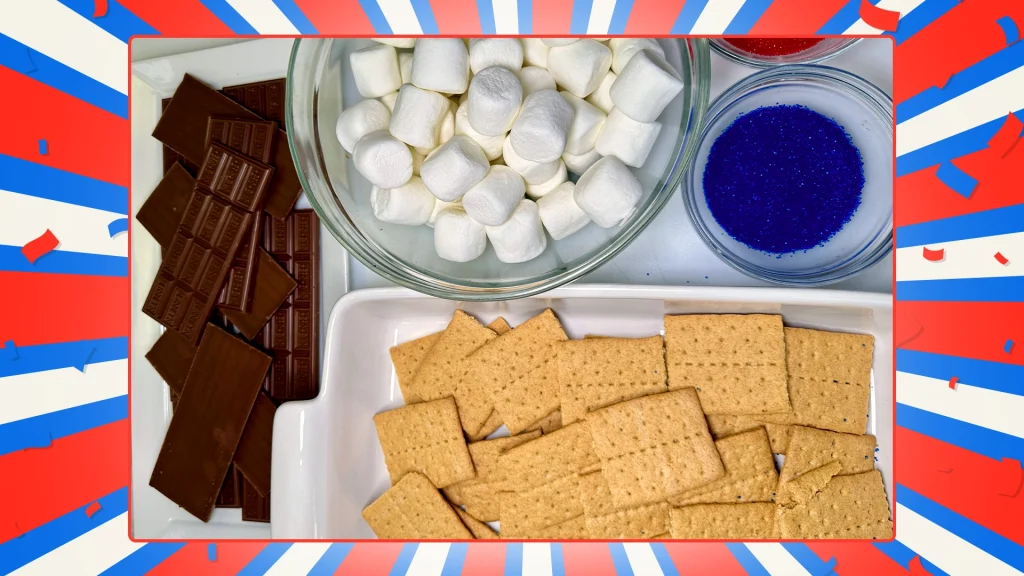 Marshmallows, graham crackers, blue and red sugar and chocolate are shown in respective bowls